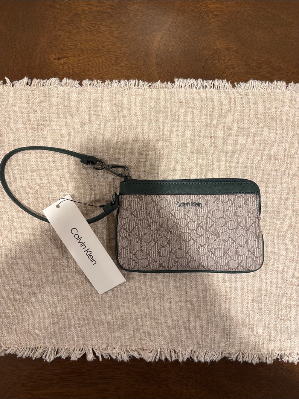 Calvin Klein Beige Monogram Wristlet with Green Trim